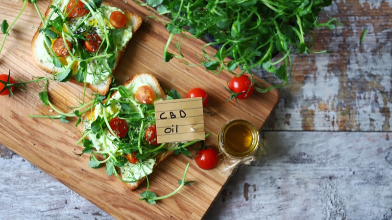 Healthy toasts with microgreens and cbd oil
